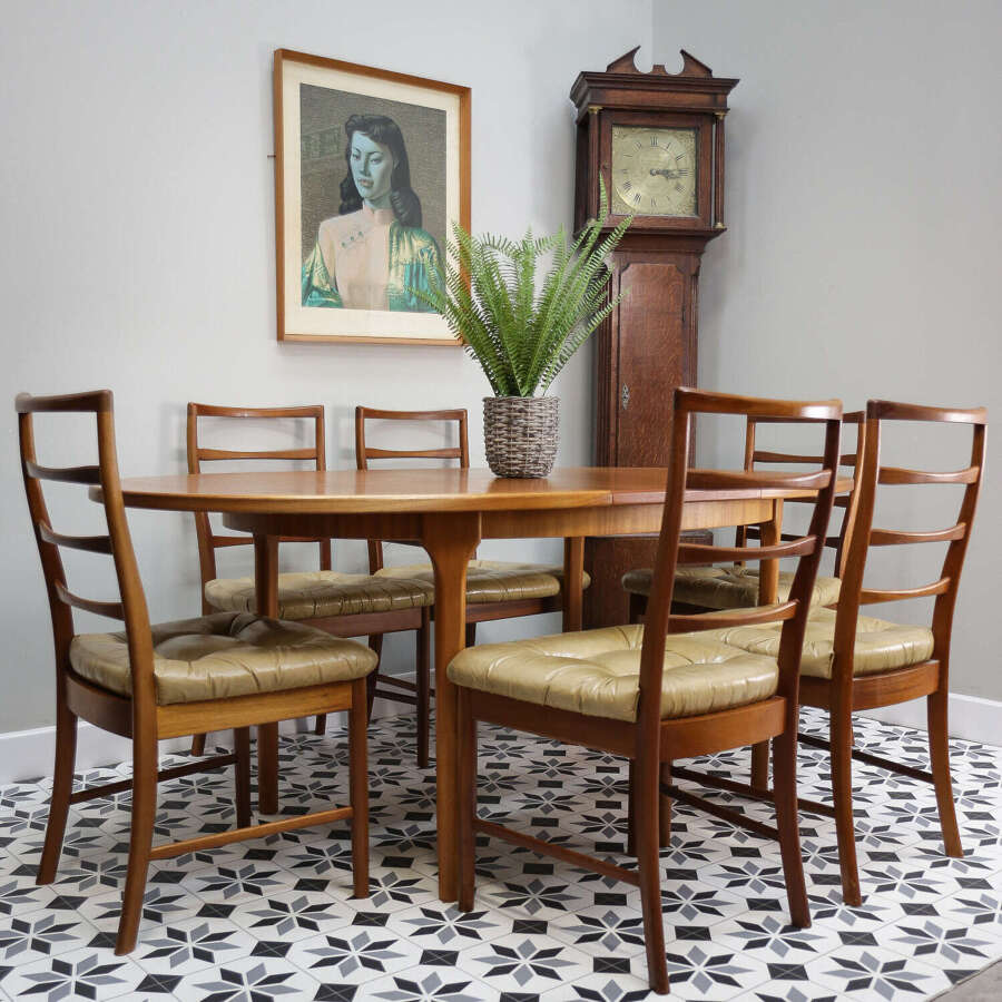 Mcintosh Dining Table and Chairs in Teak. Table Extends 6 Standard Chairs