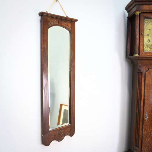 A Pair of Victorian Wall Mirrors Bevel Edged Glass Carved Top and Bottom